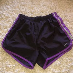 Grey and purple Nike running shorts